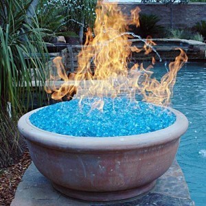 Fire glass instead of logs or lava rock in your gas fire pit. Stunning!