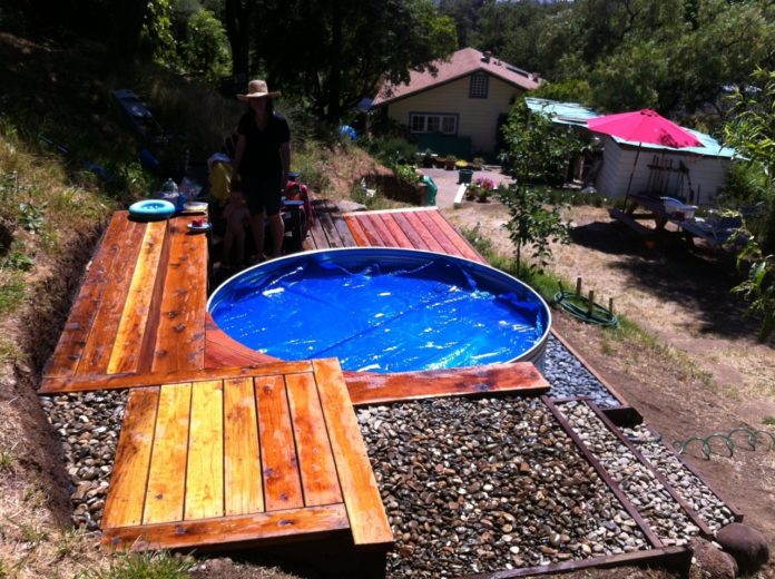 How One Family Made Cooling Swimming Pool From a Livestock Tank - The Homestead Survival