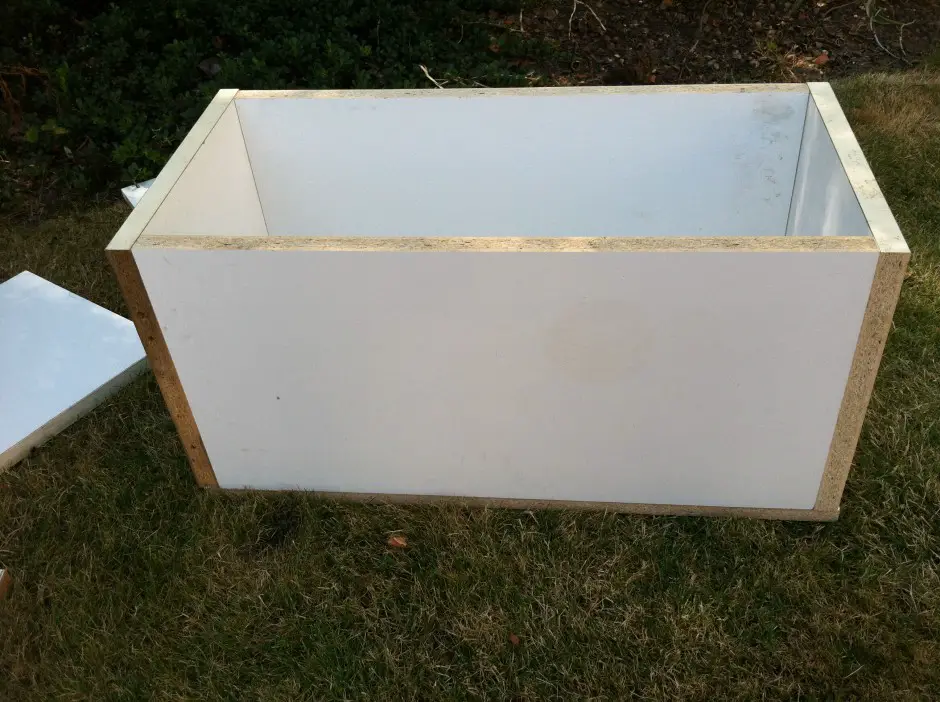 This is the outer box. I built it from melamine coated particle board. This is a great choice for cement casting. In this case it was an old desk that got broken when we moved into this house. I took it apart and cut up.