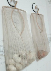 Laundry bags for onions and potatoes. This would work with the peg board. Via: Pinterest