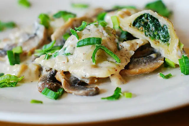 Goat Cheese And Spinach Ravioli in Mushroom and Parmesan Sauce