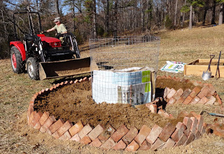 The second row of bricks clearly tilt in towardsthe compost basket in the center.